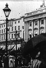 Leisurely Pedestrians, Open Topped Buses and Hansom Cabs with Trotting Horses